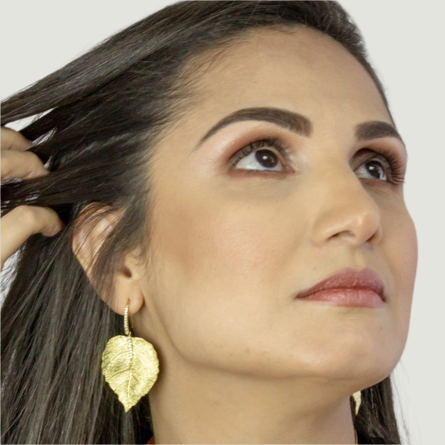 Gold plated in brass earrings with zircons