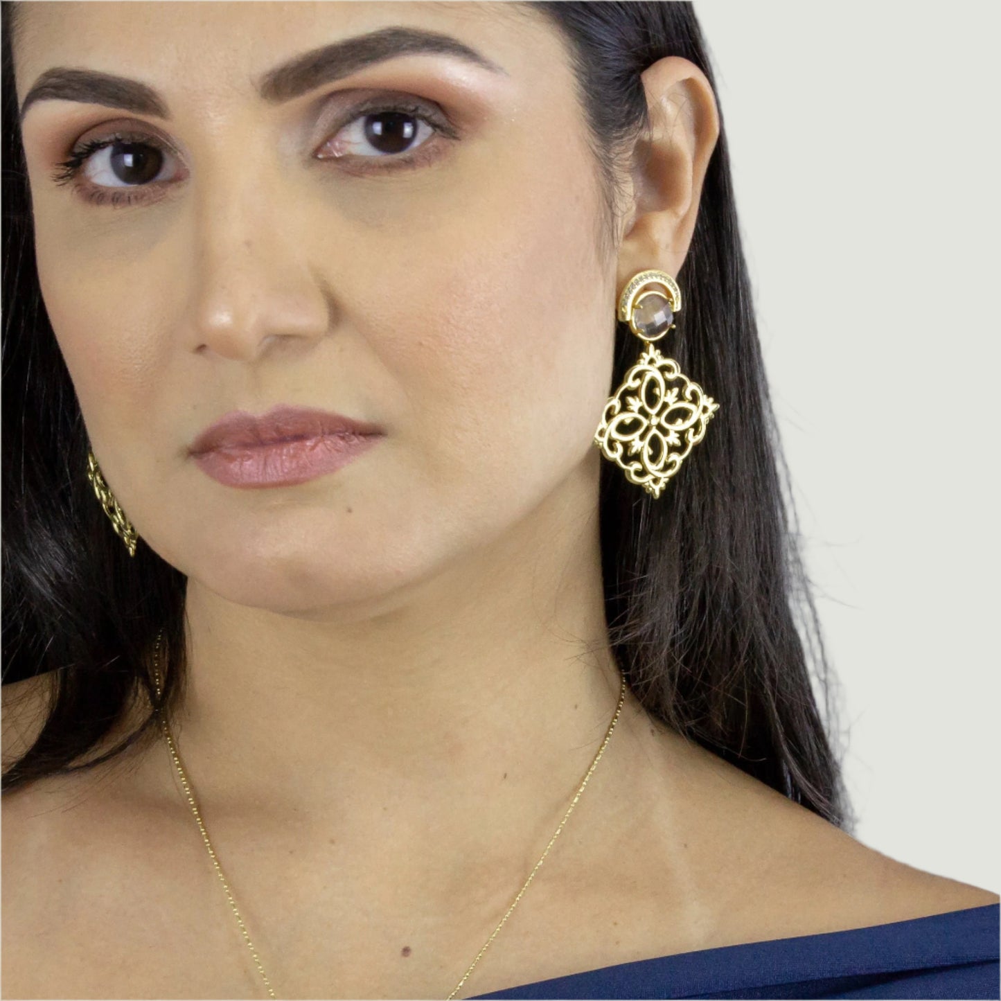Gold plated in brass with crystal and zirconia earring