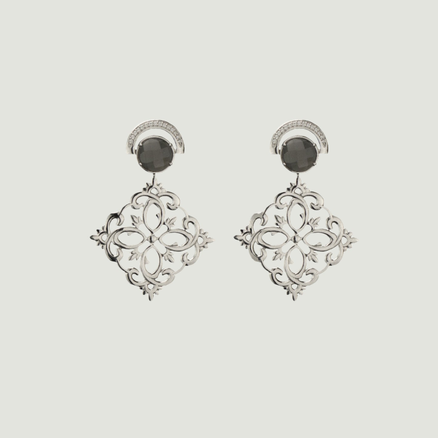 Rhodium plated in brass with crystal and zirconia earring